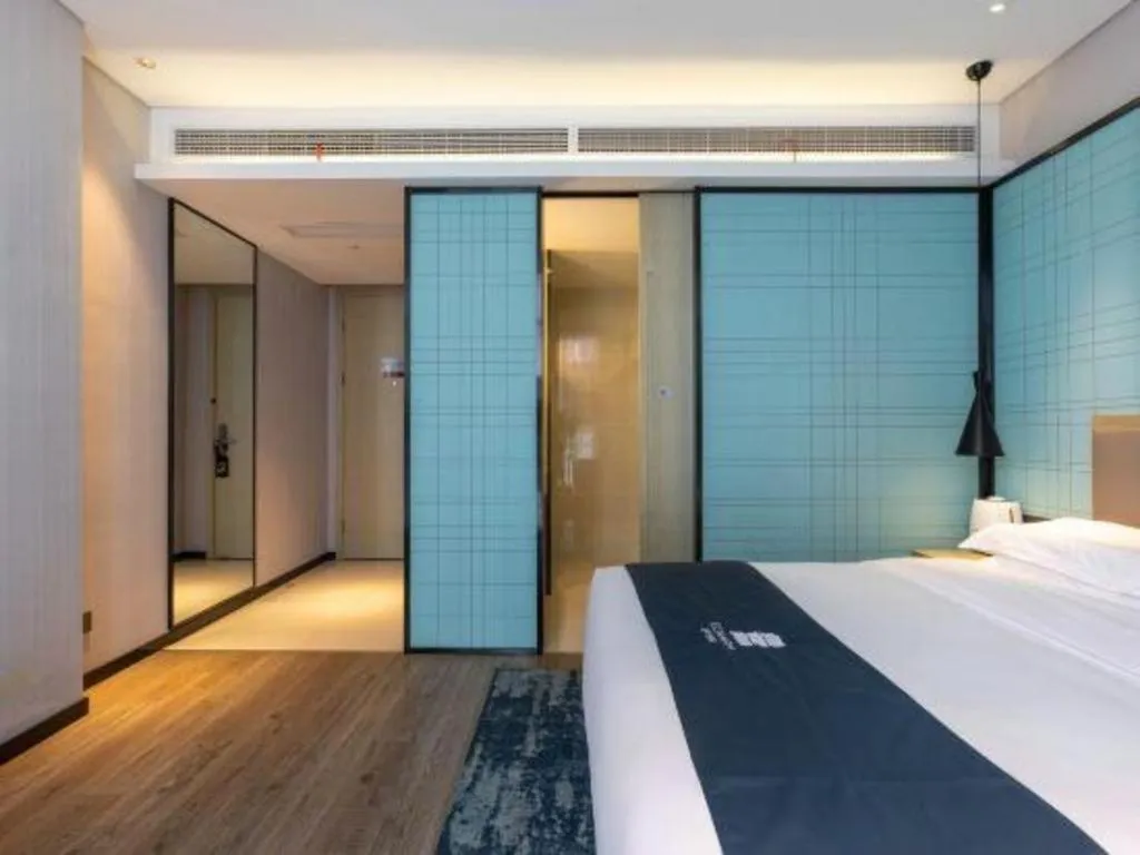 Bed in Echarm Hotel Nanjing Jiangning Tianyin Avenue Metro Station