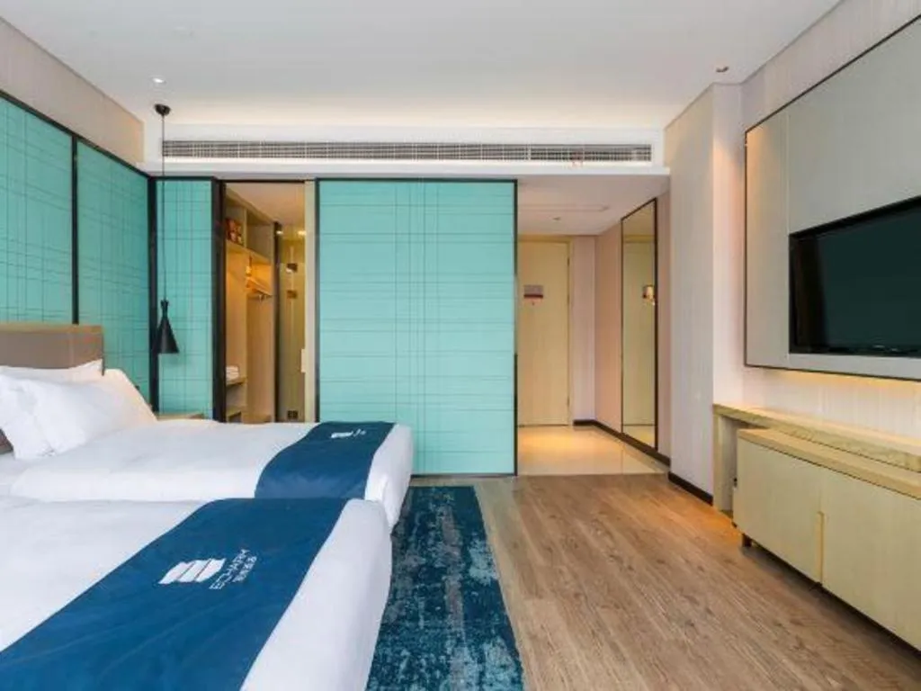 Bed in Echarm Hotel Nanjing Jiangning Tianyin Avenue Metro Station