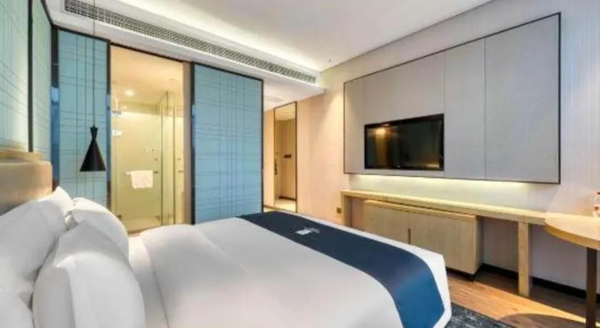 Bed in Echarm Hotel Nanjing Jiangning Tianyin Avenue Metro Station