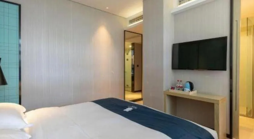 Bed in Echarm Hotel Nanjing Jiangning Tianyin Avenue Metro Station