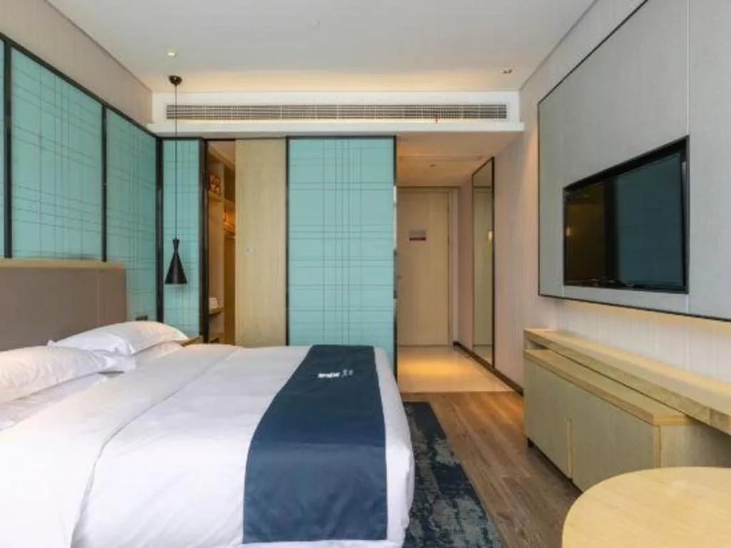 Bed in Echarm Hotel Nanjing Jiangning Tianyin Avenue Metro Station