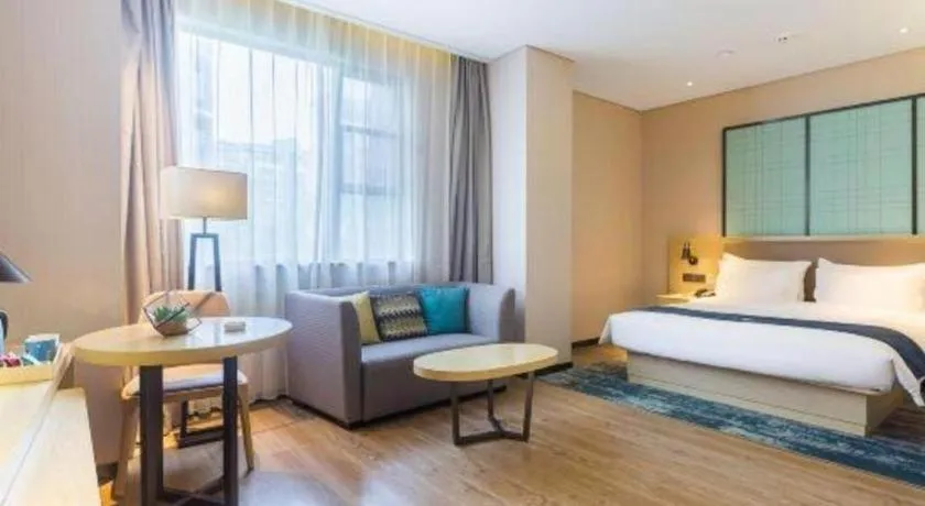 Bed in Echarm Hotel Nanjing Jiangning Tianyin Avenue Metro Station