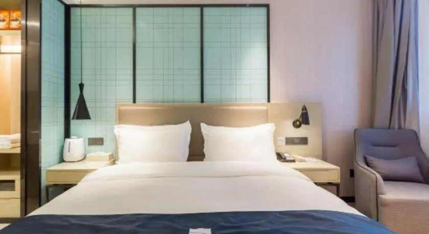 Bed in Echarm Hotel Nanjing Jiangning Tianyin Avenue Metro Station