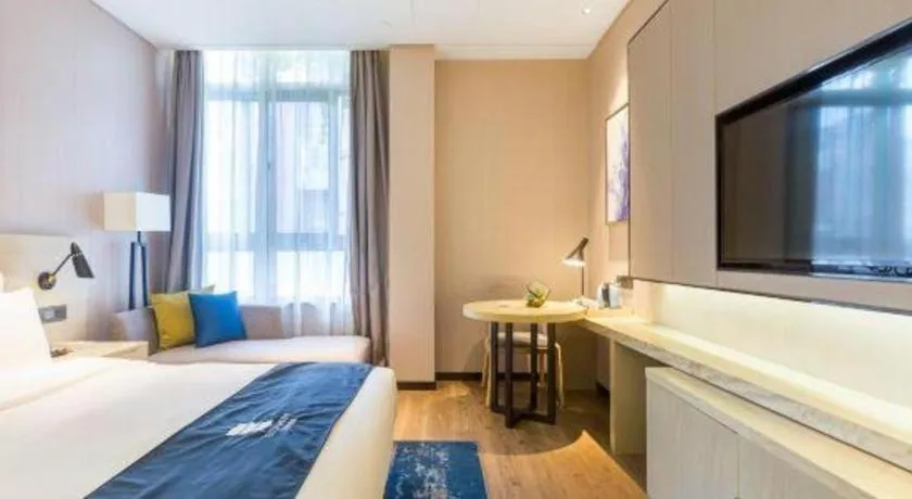 Bed in Echarm Hotel Nanjing Jiangning Tianyin Avenue Metro Station