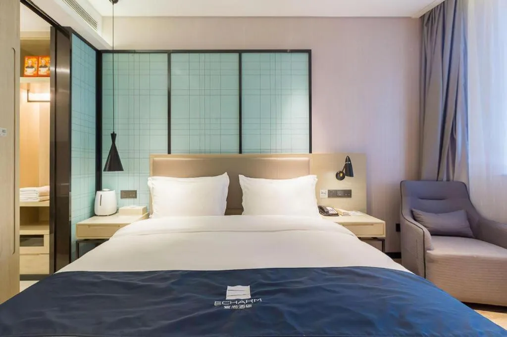 Bed in Echarm Hotel Nanjing Jiangning Tianyin Avenue Metro Station