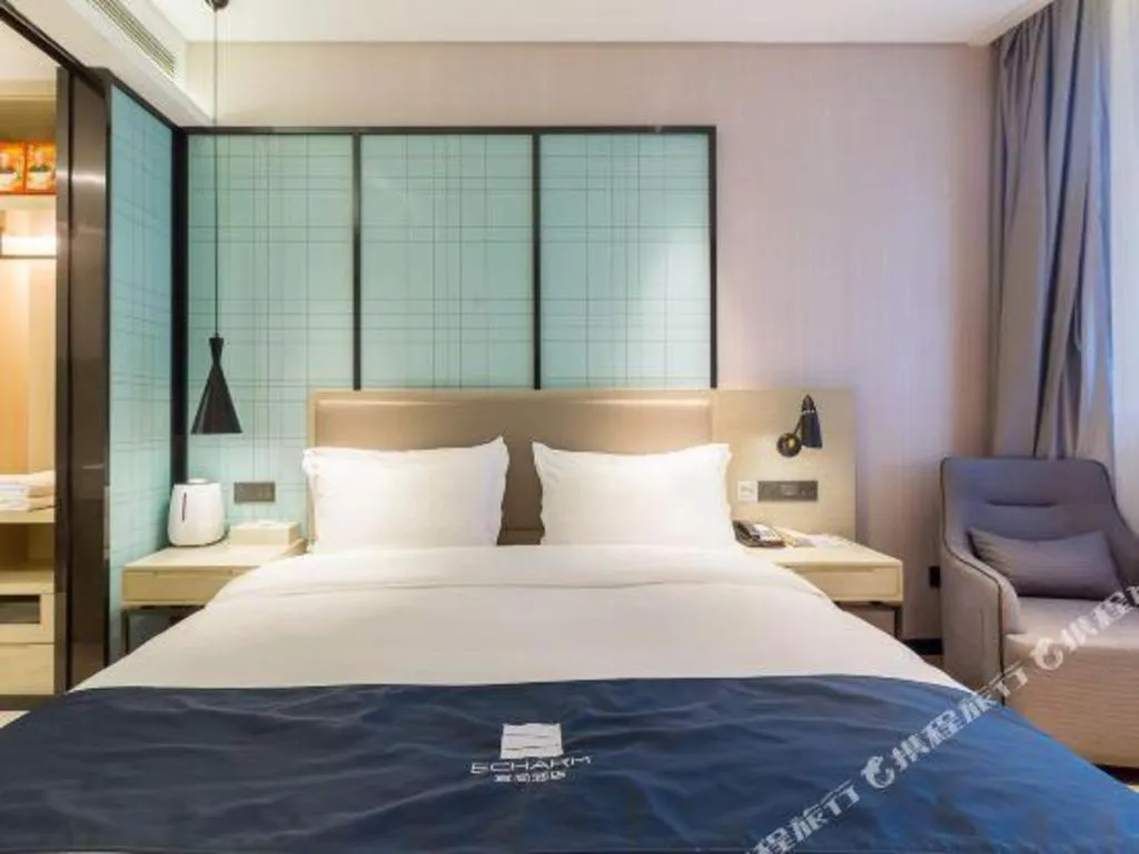 Bed in Echarm Hotel Nanjing Jiangning Tianyin Avenue Metro Station