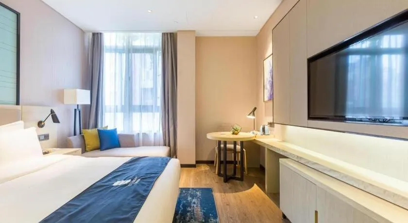 Bed in Echarm Hotel Nanjing Jiangning Tianyin Avenue Metro Station