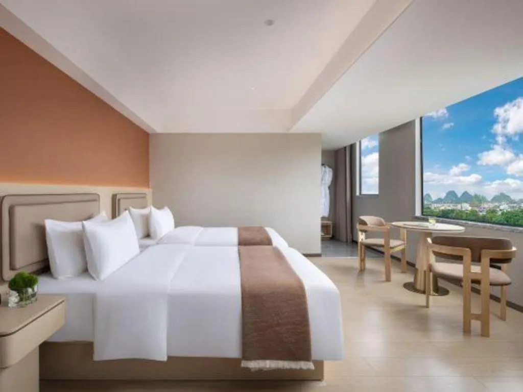 Bed in Immersing Hotel Guilin Two Rivers and Four Lakes Dongxi Alley