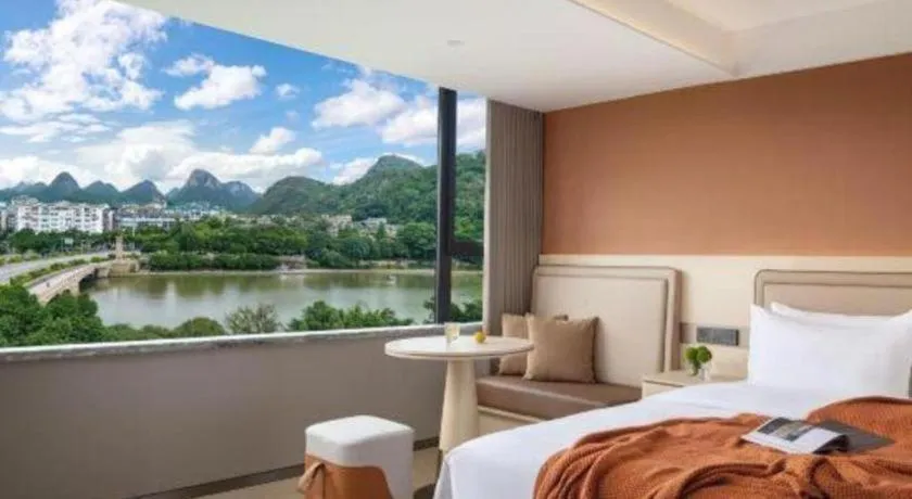 Bed in Immersing Hotel Guilin Two Rivers and Four Lakes Dongxi Alley