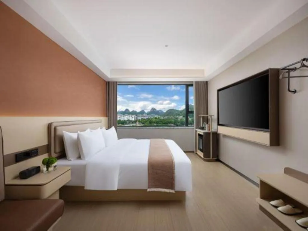 Bed in Immersing Hotel Guilin Two Rivers and Four Lakes Dongxi Alley