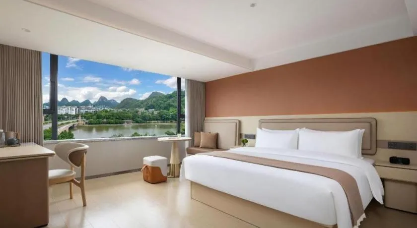 Bed in Immersing Hotel Guilin Two Rivers and Four Lakes Dongxi Alley