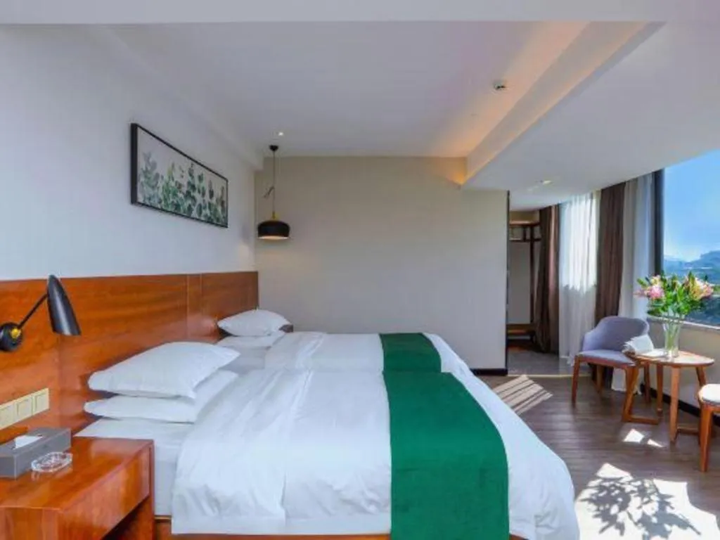 Bed in Immersing Hotel Guilin Two Rivers and Four Lakes Dongxi Alley