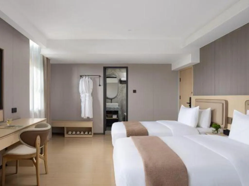 Bed in Immersing Hotel Guilin Two Rivers and Four Lakes Dongxi Alley
