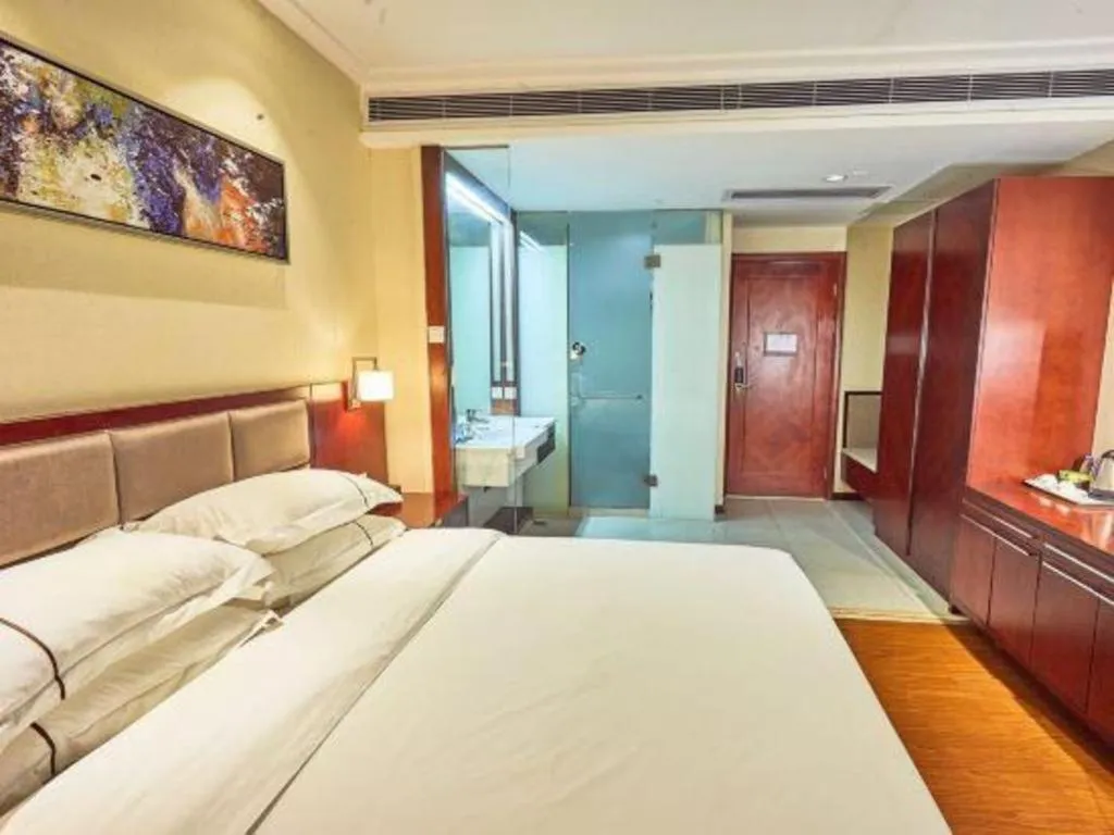 Bed in Borrman Hotel Guangzhou Changlong Shiqiao Metro Station