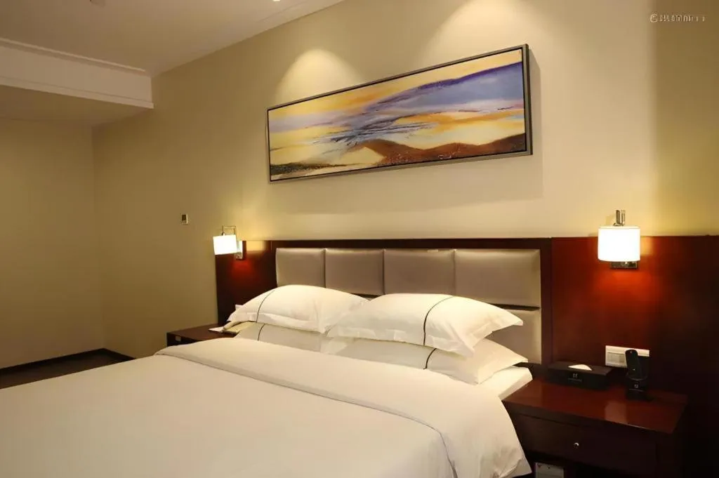 Bed in Borrman Hotel Guangzhou Changlong Shiqiao Metro Station