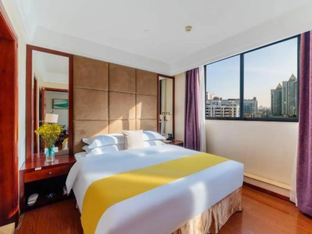 Bed in Borrman Hotel Guangzhou Changlong Shiqiao Metro Station