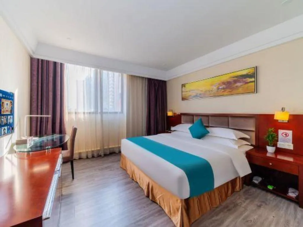 Bed in Borrman Hotel Guangzhou Changlong Shiqiao Metro Station