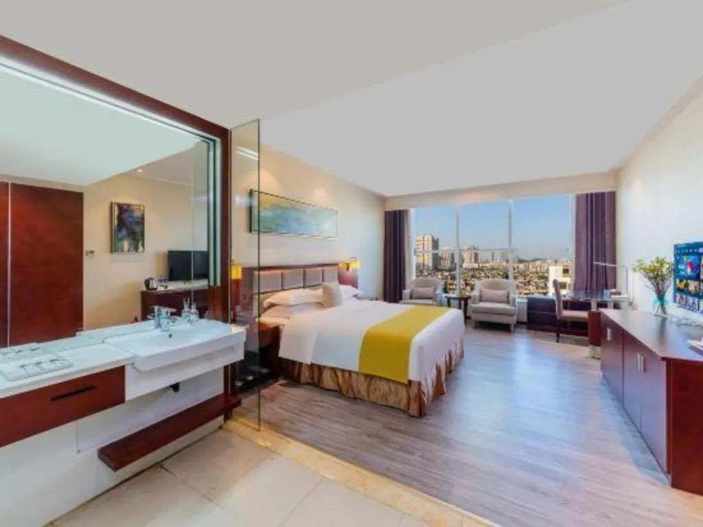 Bed in Borrman Hotel Guangzhou Changlong Shiqiao Metro Station