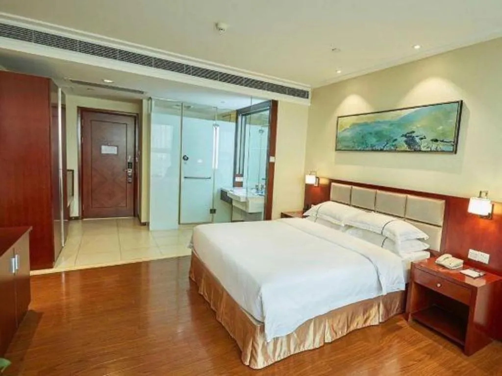 Bed in Borrman Hotel Guangzhou Changlong Shiqiao Metro Station