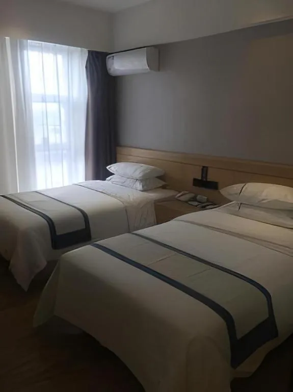 Bed in City Comfort Inn Yi'Ning Jichang Road Shanghaicheng