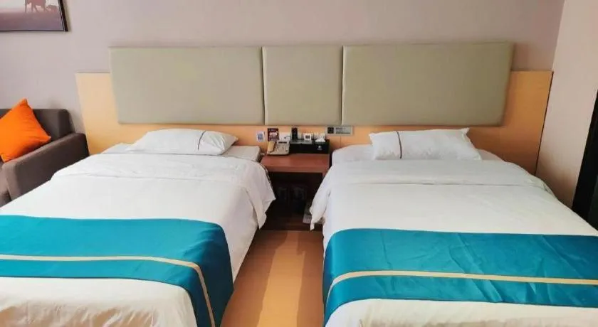 Bed in JTOUR Inn Maoming Gaozhou Guabangling Park