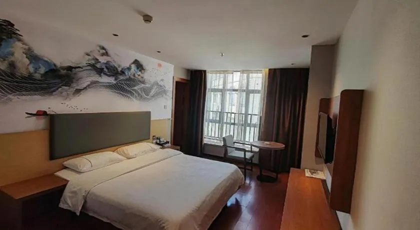 Bed in JTOUR Inn Maoming Gaozhou Guabangling Park