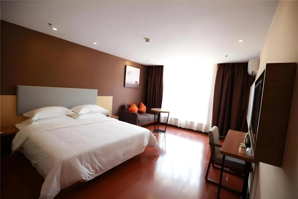 Bed in JTOUR Inn Maoming Gaozhou Guabangling Park