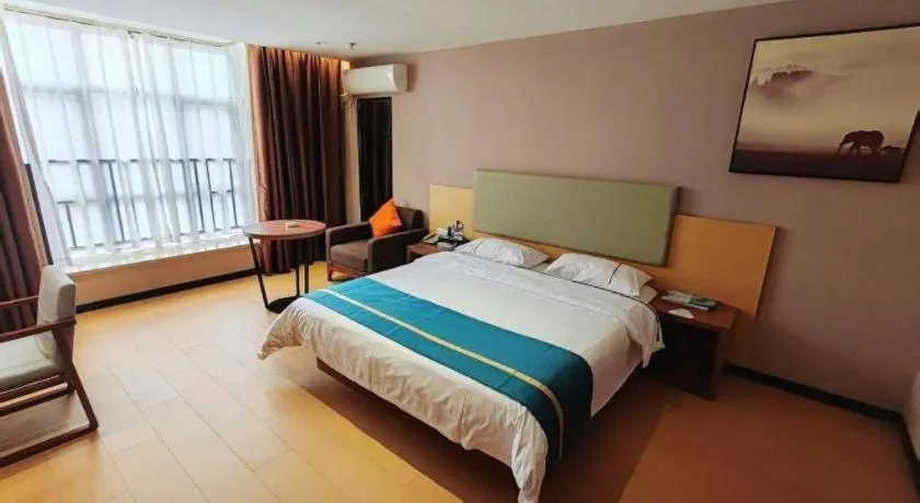 Bed in JTOUR Inn Maoming Gaozhou Guabangling Park