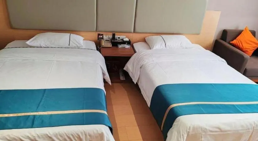Bed in JTOUR Inn Maoming Gaozhou Guabangling Park