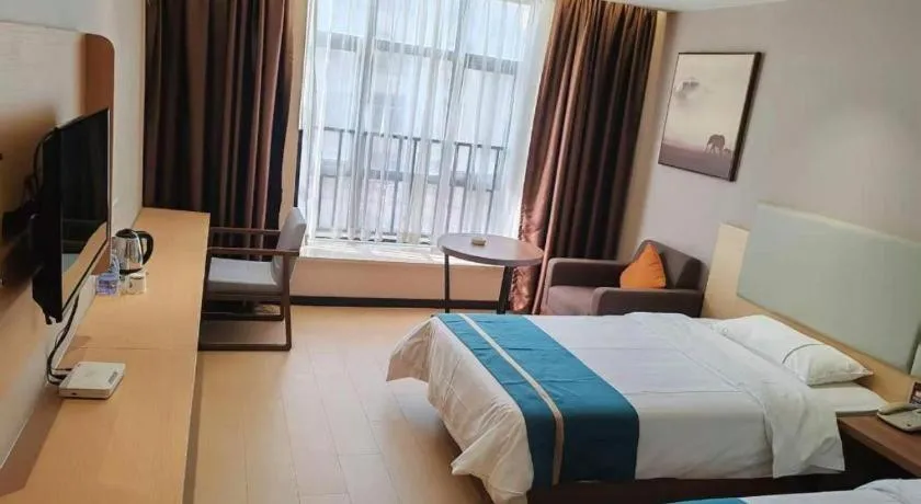 Bed in JTOUR Inn Maoming Gaozhou Guabangling Park