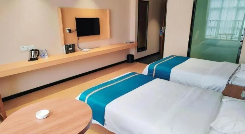 Bed in JTOUR Inn Maoming Gaozhou Guabangling Park