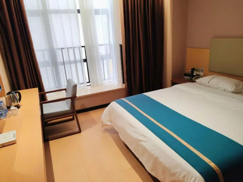 Bed in JTOUR Inn Maoming Gaozhou Guabangling Park