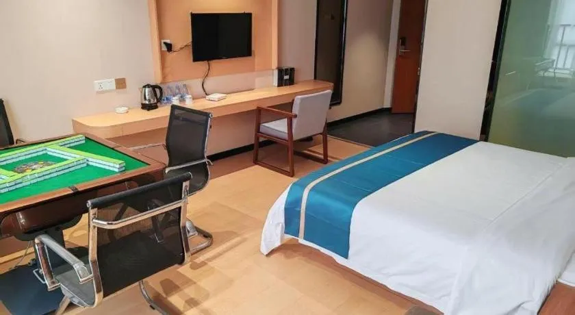 Bed in JTOUR Inn Maoming Gaozhou Guabangling Park
