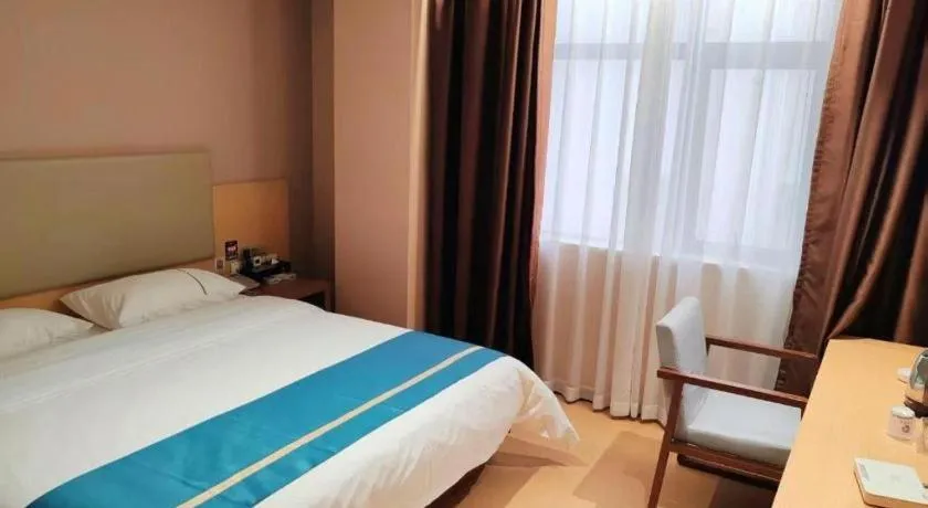 Bed in JTOUR Inn Maoming Gaozhou Guabangling Park