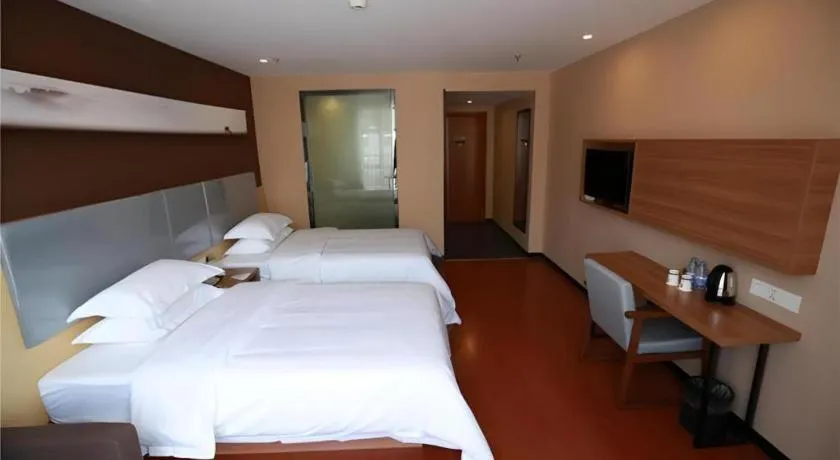 Bed in JTOUR Inn Maoming Gaozhou Guabangling Park
