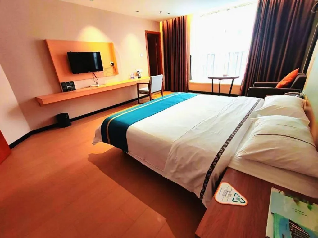 Bed in JTOUR Inn Maoming Gaozhou Guabangling Park