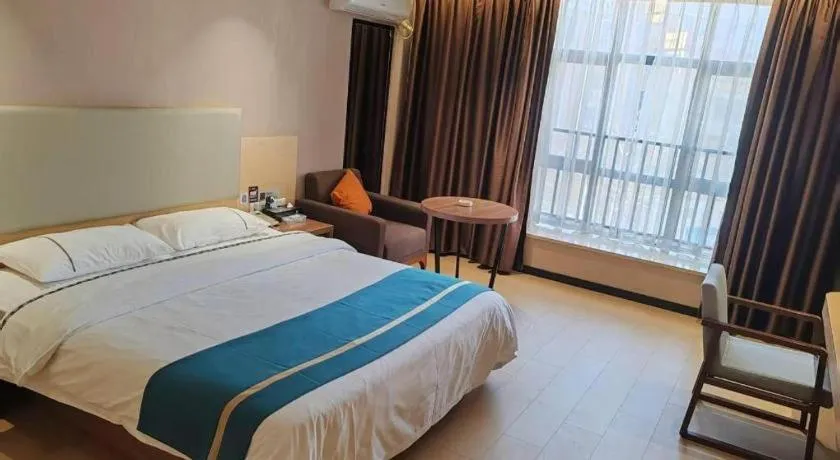 Bed in JTOUR Inn Maoming Gaozhou Guabangling Park