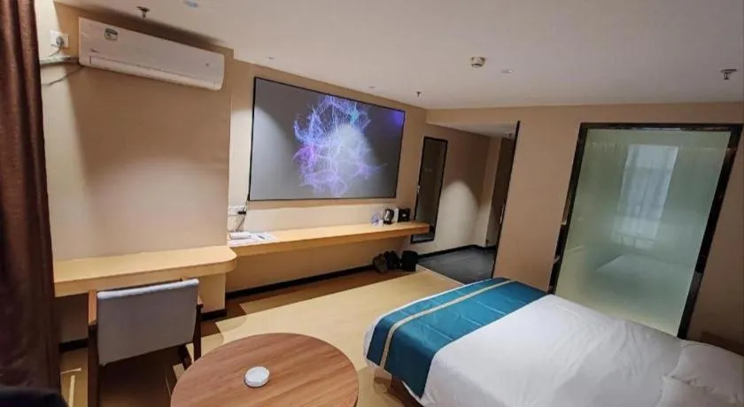 Bed in JTOUR Inn Maoming Gaozhou Guabangling Park