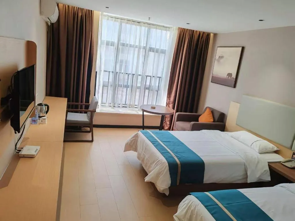 Bed in JTOUR Inn Maoming Gaozhou Guabangling Park