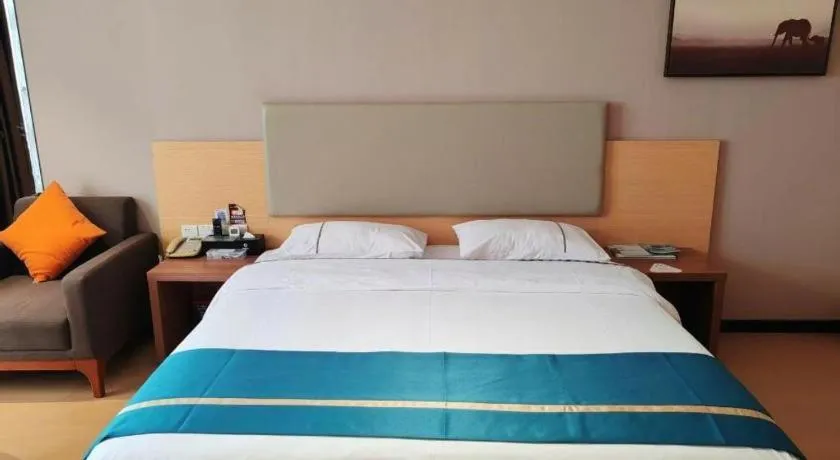 Bed in JTOUR Inn Maoming Gaozhou Guabangling Park