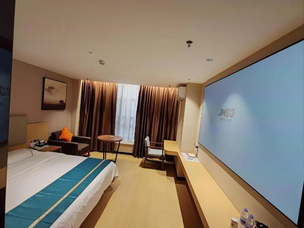Bed in JTOUR Inn Maoming Gaozhou Guabangling Park
