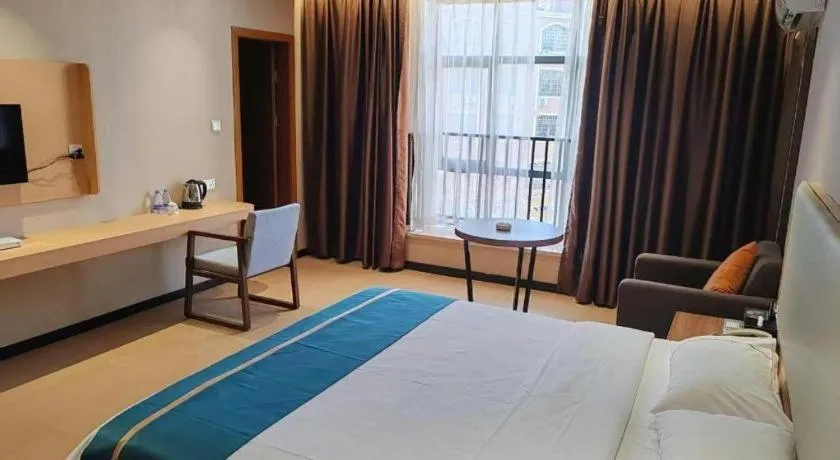 Bed in JTOUR Inn Maoming Gaozhou Guabangling Park