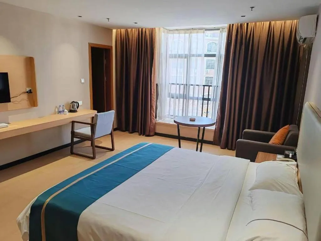 Bed in JTOUR Inn Maoming Gaozhou Guabangling Park
