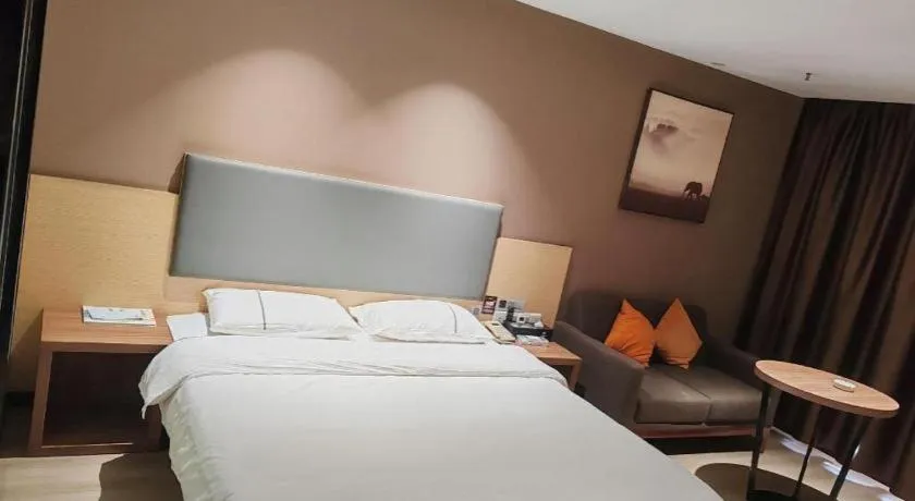 Bed in JTOUR Inn Maoming Gaozhou Guabangling Park