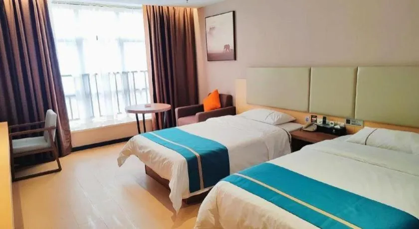 Bed in JTOUR Inn Maoming Gaozhou Guabangling Park