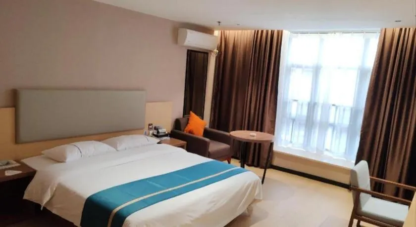 Bed in JTOUR Inn Maoming Gaozhou Guabangling Park