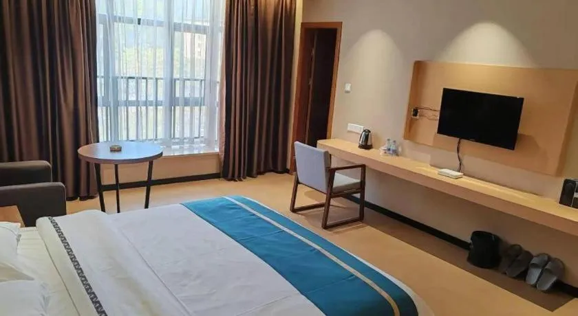 Bed in JTOUR Inn Maoming Gaozhou Guabangling Park
