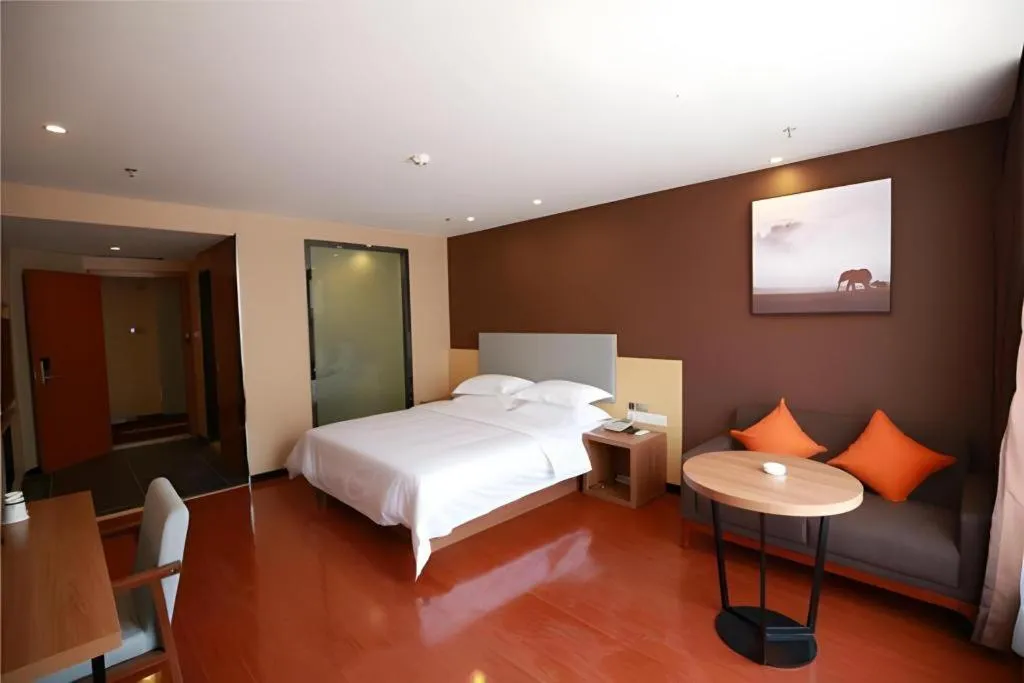 Bed in JTOUR Inn Maoming Gaozhou Guabangling Park