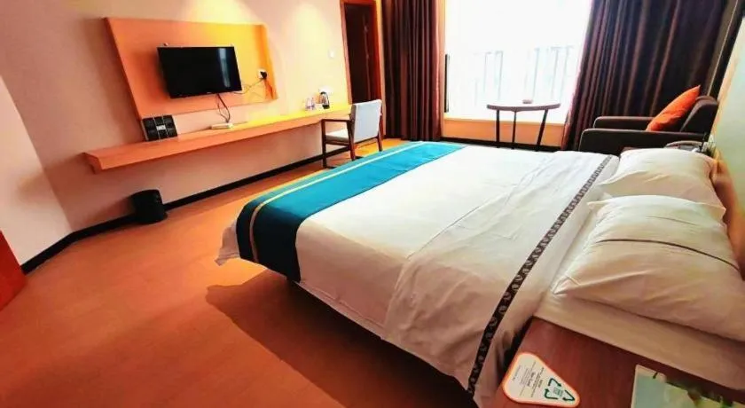 Bed in JTOUR Inn Maoming Gaozhou Guabangling Park