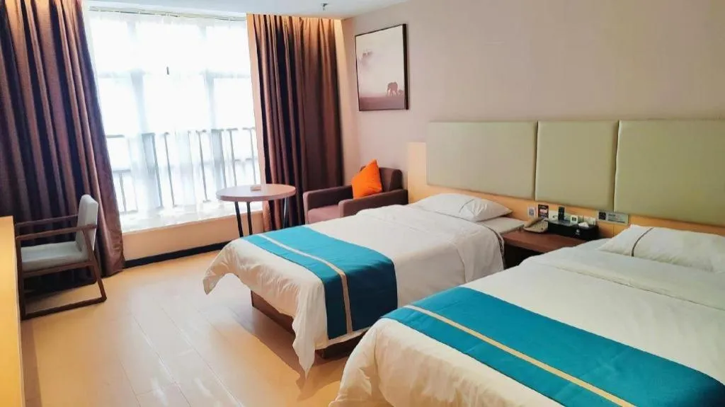 Bed in JTOUR Inn Maoming Gaozhou Guabangling Park